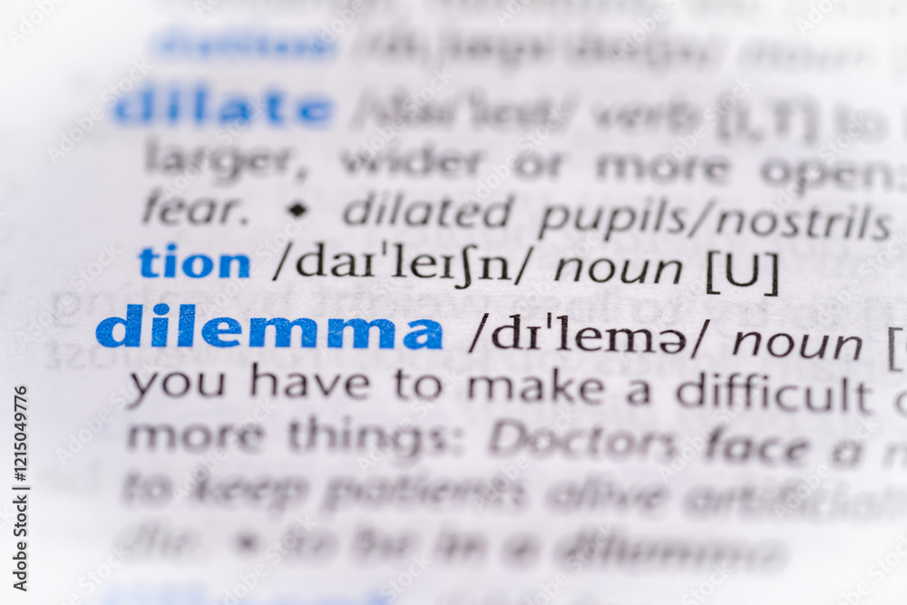 Dilemma word in a dictionary. Selective focus, close up. Dilemma word in a dictionary. Selective focus, close up.