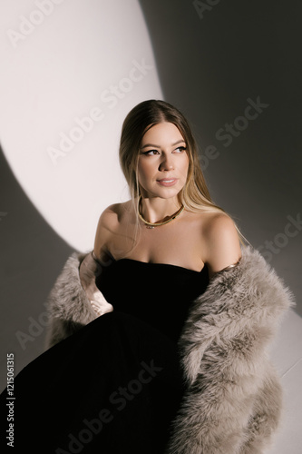 Obraz na płótnie Portrait of a woman in a studio with professional lighting in a smart dress with gloves and a fur coat w salonie