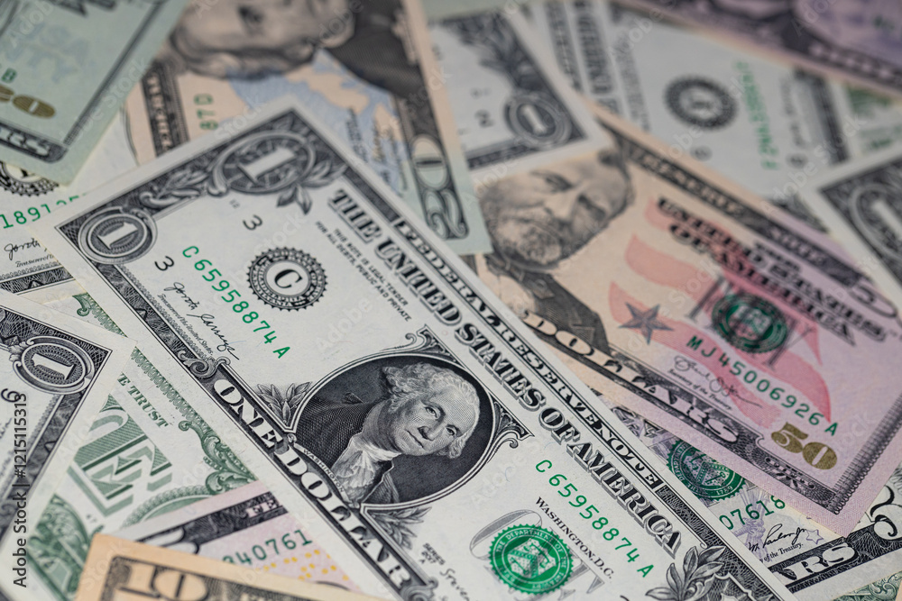 different US dollar banknotes background different US dollar banknotes background