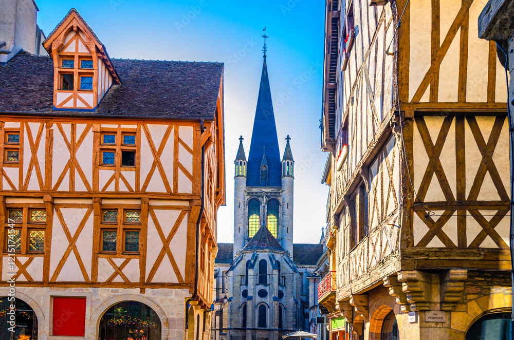 Dijon cityscape with old medieval houses fachwerk facades and Eglise Notre-Dame of Dijon Roman Catholic church in old town city historical centre, Bourgogne-Franche-Comte region, France