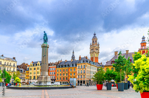 Lille cityscape, La Grand Place square in city center, Flemish mannerist architecture style buildings, Column of Goddess and bell tower Chamber of Commerce, Hauts-de-France Region, Northern France photo