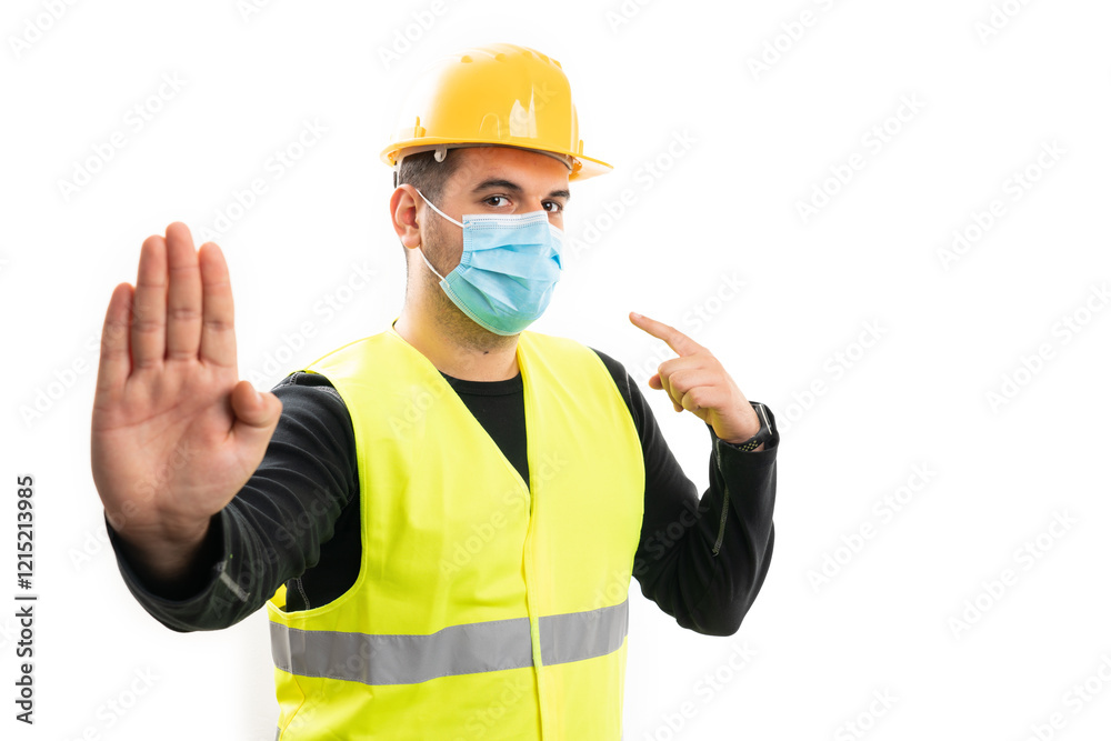 Builder man pointing at mask making stop gesture with palm Builder man pointing at mask making stop gesture with palm
