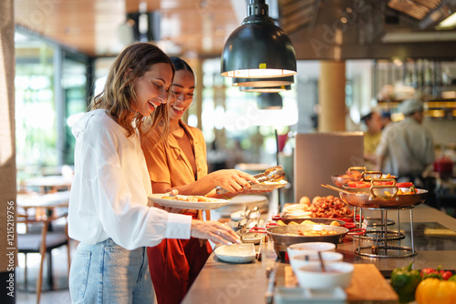 Diverse Young Women Enjoying Self-Service Restaurant