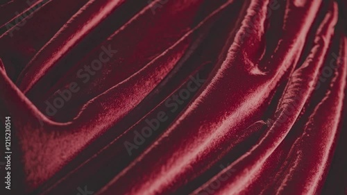 Velvet fabric with dynamic texture, deep red and neutral grey, minimalistic setting for fashion or art