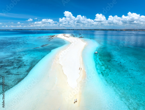 Fototapeta Naklejka Na Ścianę i Meble -  Aerial view of Nakupenda island, sandbank in ocean, white sandy beach, blue sea during low tide on sunny summer day. Zanzibar. Top view of sand spit, clear water, people, sky with clouds. Tropical