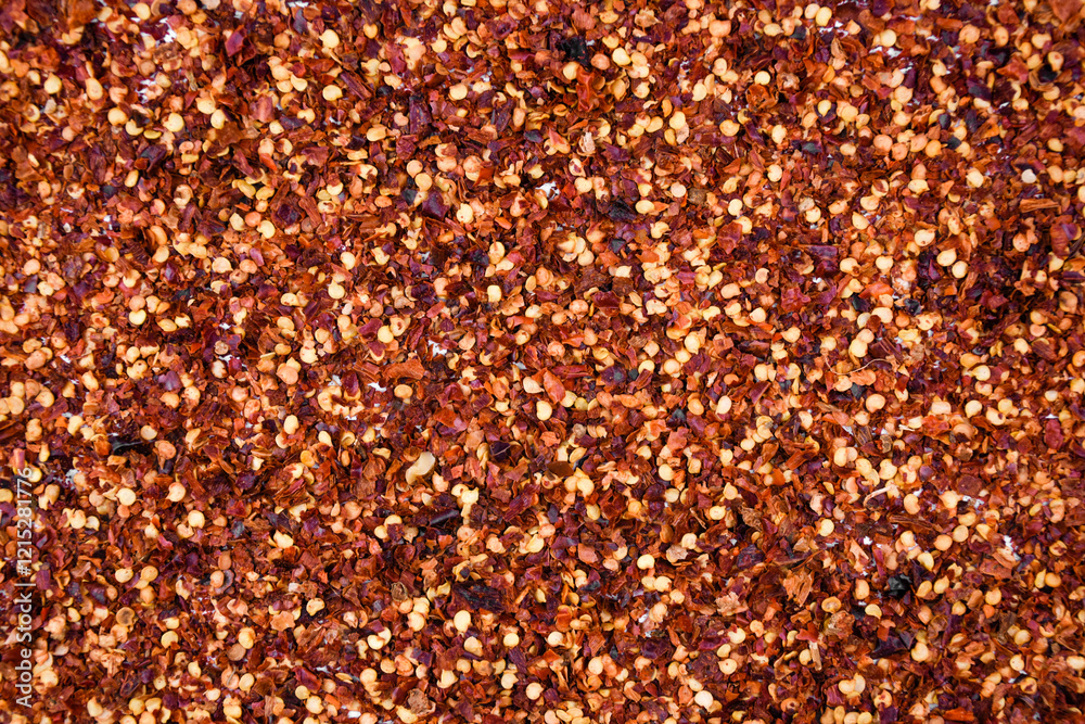 background of crushed chili flakes. background of crushed chili flakes.