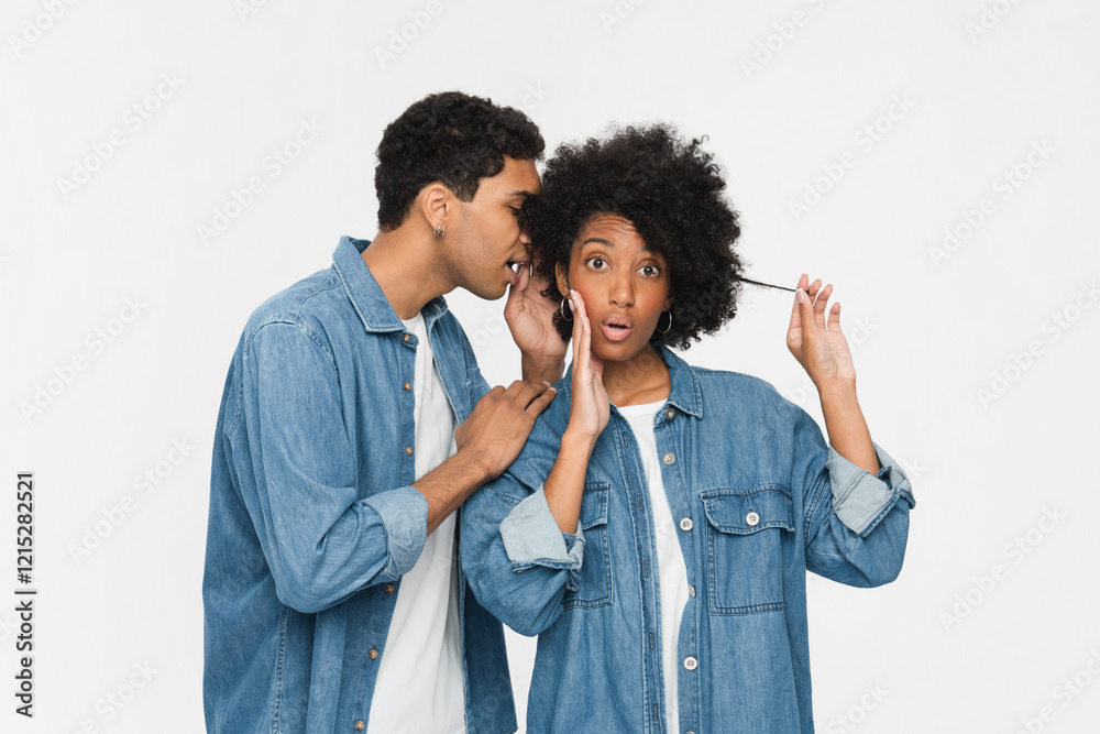 Big secret. Joyful black man guy boyfriend whispering something into his girlfriend's ear, cheerful couple friends family lovers gossiping together on white studio background Big secret. Joyful black man guy boyfriend whispering something into his girlfriend's ear, cheerful couple friends family lovers gossiping together on white studio background