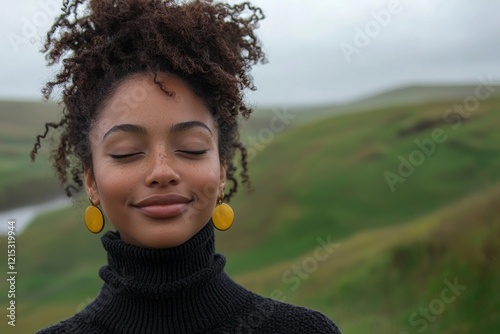 A serene woman undergoing a digital detox for her mental health, taking a respite dressed in Fandango attire photo