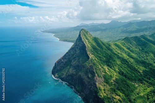 Gros Piton mountain peak in Saint Lucia Island. Aerial view of volcanic landmark. Clear blue ocean, sea, and sky in tropical paradise. Lush green plants, vegetation, and plants cover the island coast