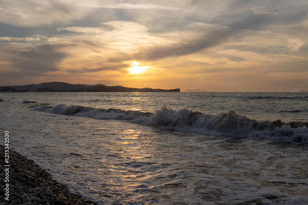 Sunset on a beach, Acharavi, Korfu, Greece Sunset on a beach, Acharavi, Korfu, Greece