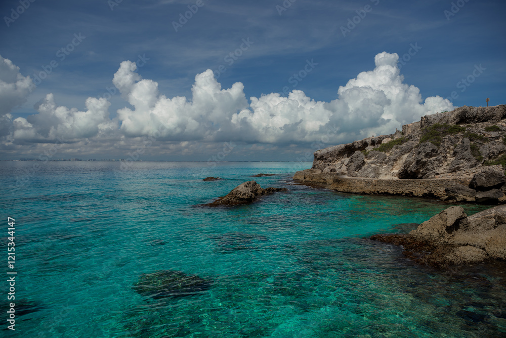 Fototapeta premium Rocky Caribbean Sea coastline with rocks and azure water.