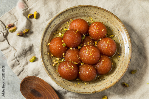 Homemade Indian Gulab Jamun Dessert photo