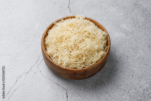 Homemade uncooked kataifi or kadaifi dough.