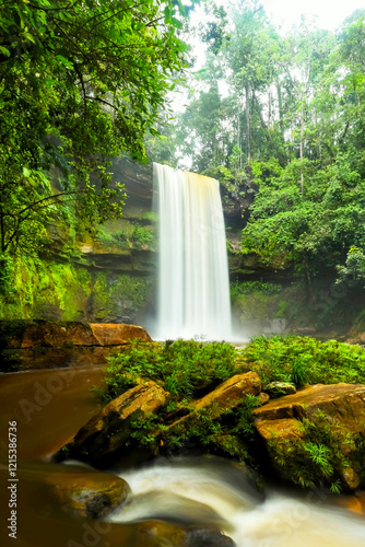 Scenic view of Fowzi Waterfall located in Maliau Basin Conservation Area in Sabah, Malaysia photo