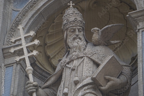 Close up of a statue of Pope Gregory I, Saint Gregory the Great, with his famous Catholic iconography of a dove sitting on his shoulder at St. Stephen's Basilica, Budapest, Hungary