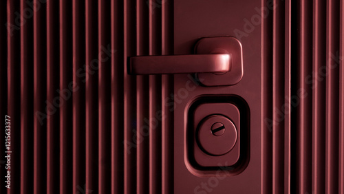 Stylish dark red door handle, mortise lock and keyhole on a modern entrance metal armored designer door. Privacy and protection of the apartment and house. Photo