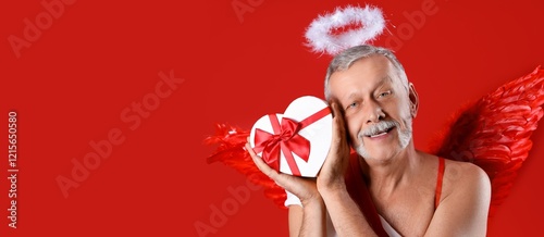 Mature man dressed as Cupid...