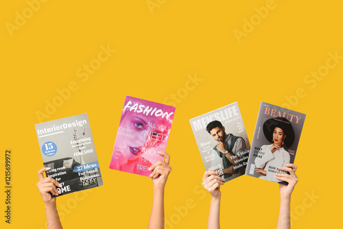 Female hands with different magazines on yellow background