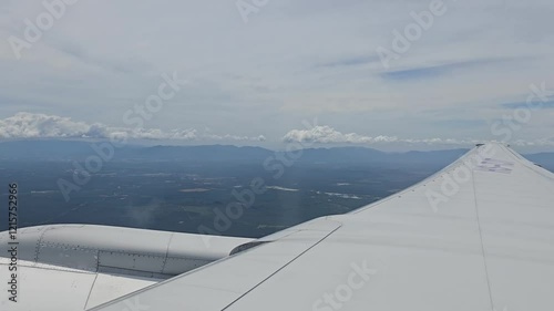 Thai Airways 777-200 HS-TJT Boeing Aircraft Right Wing View from Window Seat Landing in Kuala Lumpur, Malaysia. photo