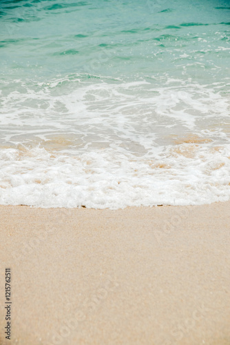 Fototapeta Naklejka Na Ścianę i Meble -  Waves of turquoise water Beach. Beautiful sandy beach and blue sea waves