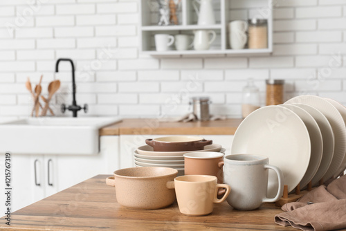 Clean dishes on wooden tabl...