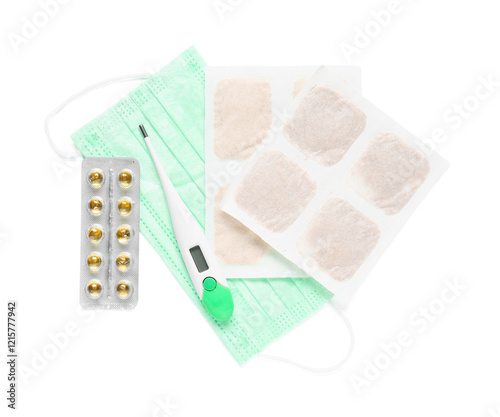 Mustard plasters with medical mask and thermometer on white background photo