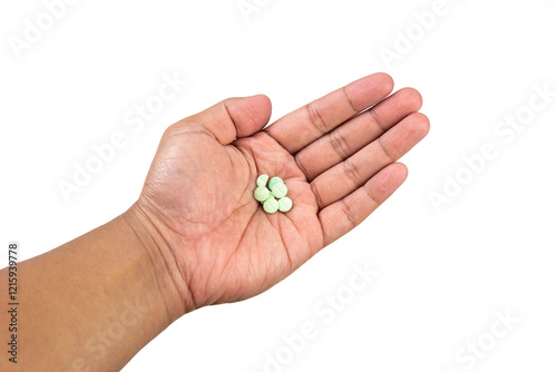 Hand holding medicine pills isolated on white background photo