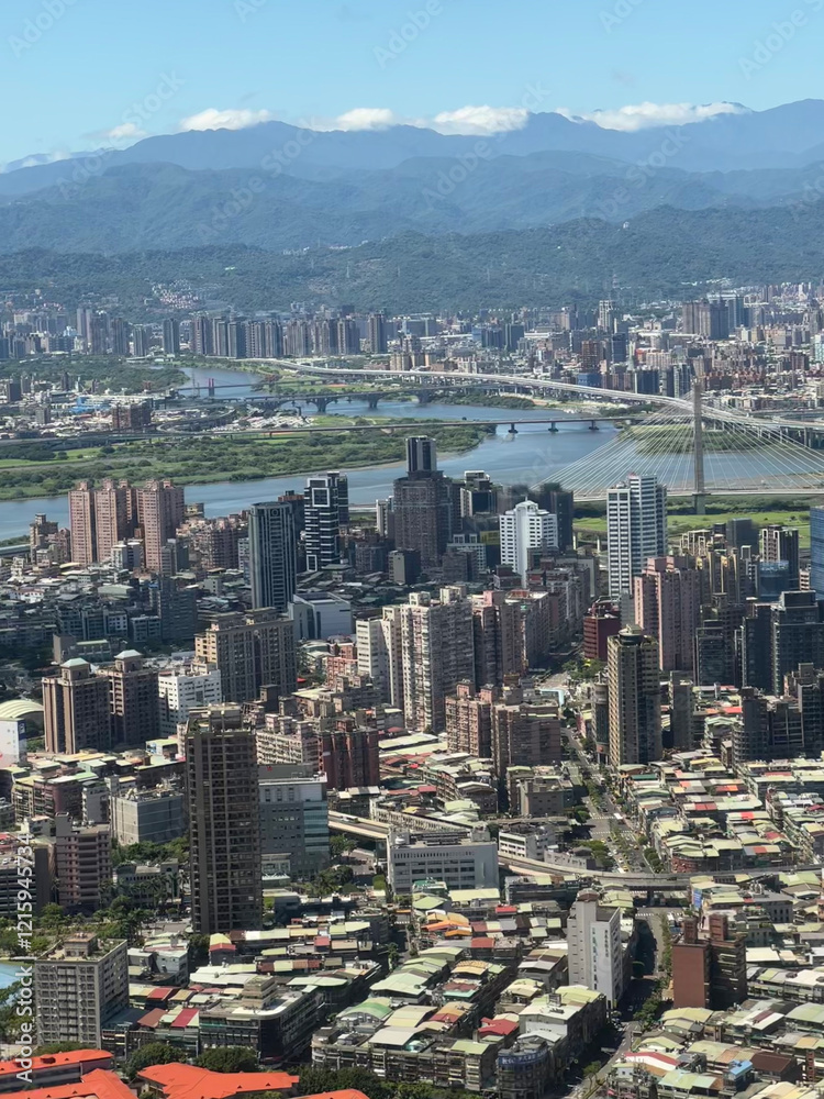 Obraz premium View of the Taipei horizon as seen during landing at the Songshan Airport -- the city's modern skyline