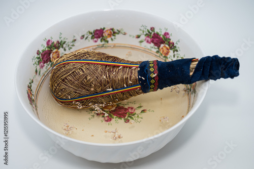 Epiphany, Holy water, Sfestoc used in the Orthodox church in Romania for blessing and protection. It is sanctified in the church and sprinkled with a bunch photo