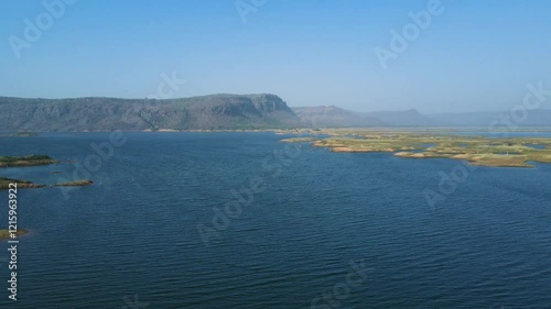 Wide aerial view of Karamchat Dam in Bihar, with the river’s tranquil flow complementing the majestic structure.