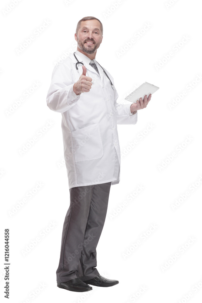 in full growth. smiling doctor with a digital tablet . in full growth. smiling doctor with a digital tablet .