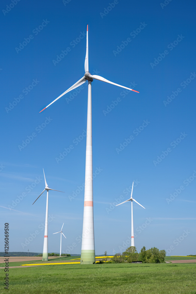 Modern wind energy plants with agricultural fields seen in Germany Modern wind energy plants with agricultural fields seen in Germany