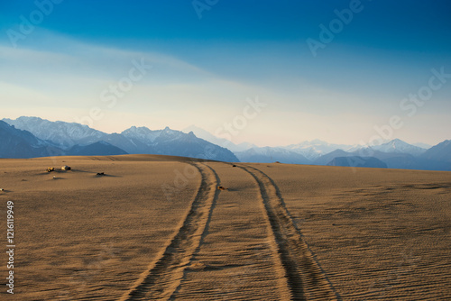 Russia. Beautiful scenery of the northernmost desert in the world. View of the Kodar Ridge. Chara sands. The region of baikaL Kodar National natural park.