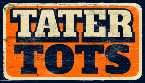 Aged and worn tater tots sign on wood