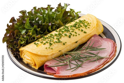 A photo of a plate containing a rolled omelette garnished with finely chopped green herbs photo