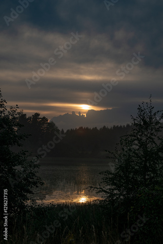 Sunset, twilight on a forest lake. Night landscape
