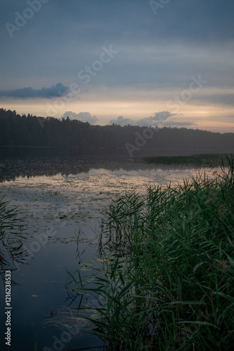 Sunset, twilight on a forest lake. Night landscape