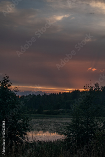 Sunset, twilight on a forest lake. Night landscape
