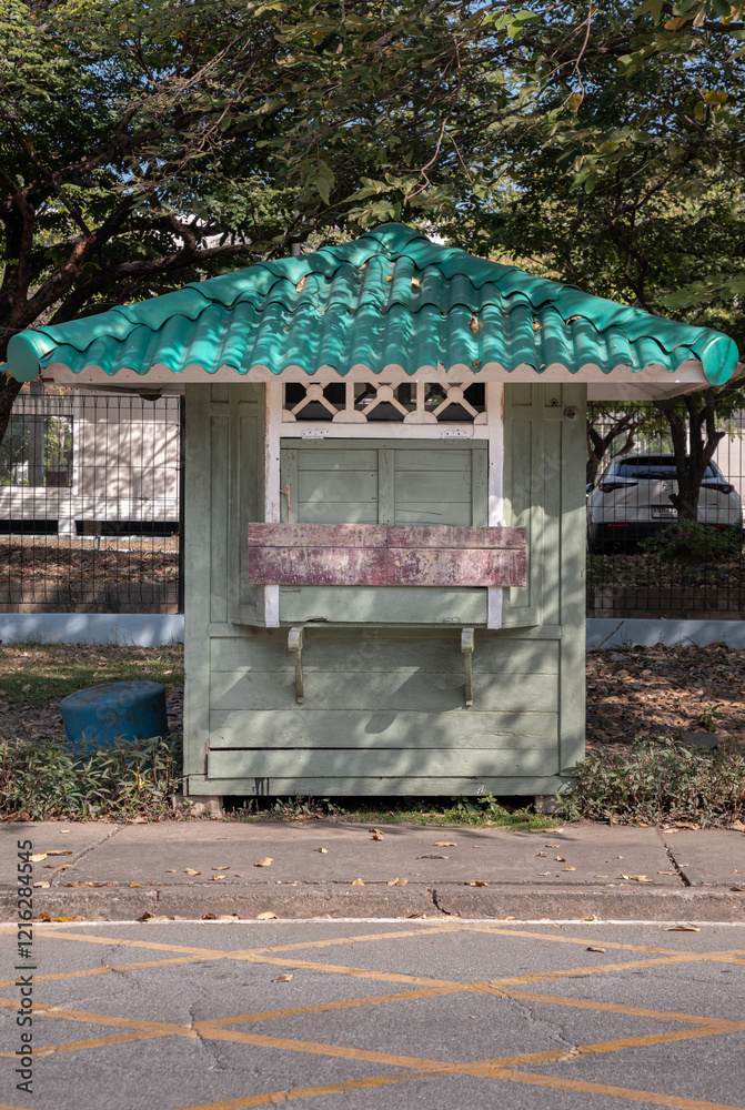 Front view of Security guard olive green booth (Guardhouse) in public park. Security guard cabin, Security Booth, use it as your Wallpaper, Poster and Copy space, Selective focus.