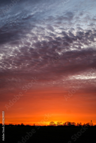 Very beautiful colorful sunset in the spring countryside