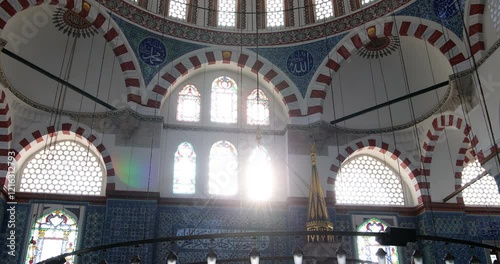 Enchanting 4K interior of Rustem Pasha Mosque at sunset. Ottoman architecture by Mimar Sinan shines amid peaceful rays, capturing a spiritual ambiance. Ramadan, islamic, muslim.