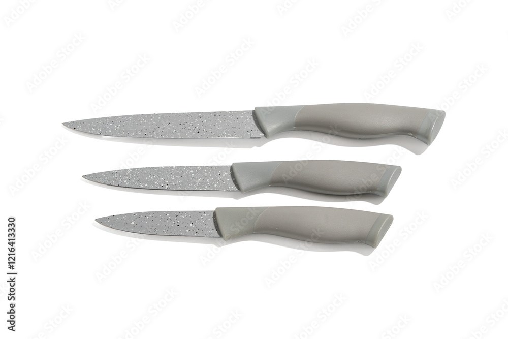 Obraz premium Three knives are shown on a white background. The knives are gray and have a pointed tip. The pens are gray, the knives are located next to each other. Kitchen knife on transparent background in PNG f