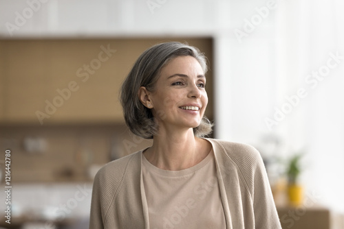 Timeless beauty. Head shot portrait happy attractive mature woman with stylish hairdo posing at home looking at distance with cheerful white toothy smile feel successful satisfied full of ideas plans Free Download Timeless beauty. Head shot portrait happy attractive mature woman with stylish hairdo posing at home looking at distance with cheerful white toothy smile feel successful satisfied full of ideas plans - GFXLoad