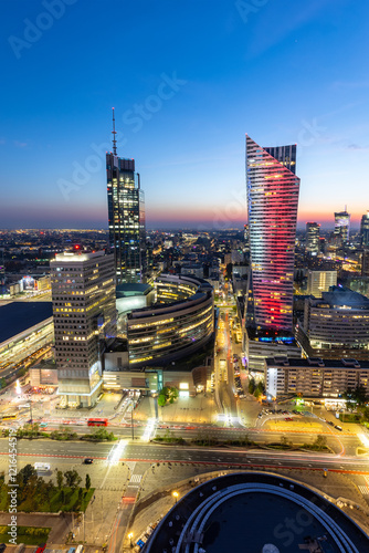 Obraz na płótnie Warsaw skyline skyscraper in downtown by night portrait format in Warsaw, Poland w salonie