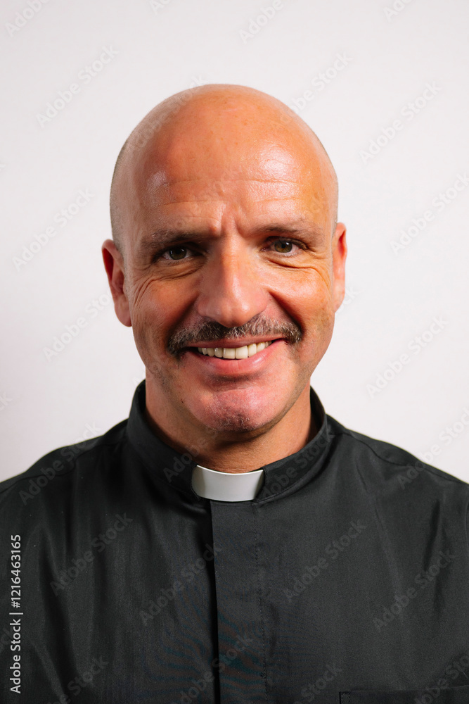 Fototapeta premium Portrait of a priest looking at the camera.