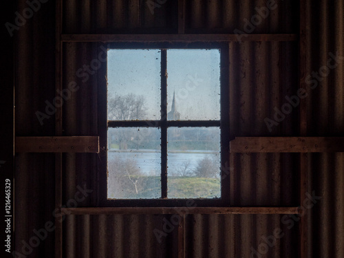 Window of an abandoned Brick Factory at Wijk bij Duurstede in the Netherlands photo