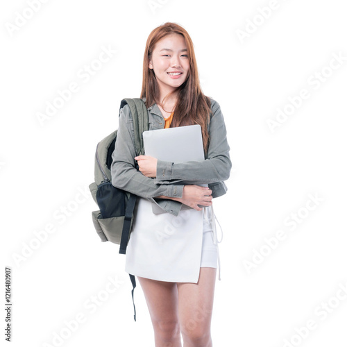 Portrait of smiling a beautiful young woman student holding textbook and laptop computer - studying online e-learning system