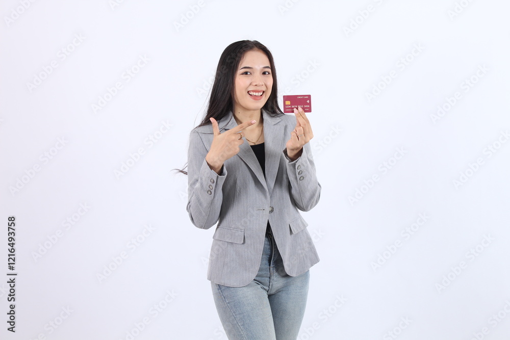 Woman Shows Credit Card and Points Happily: Finance, Payment, Shopping, and E-commerce Concepts Woman Shows Credit Card and Points Happily: Finance, Payment, Shopping, and E-commerce Concepts