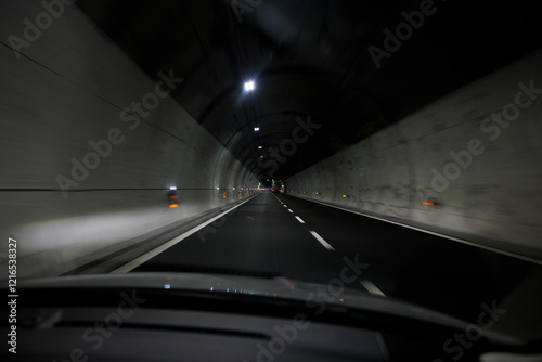 Viaggiando in una galleria in autostrada photo