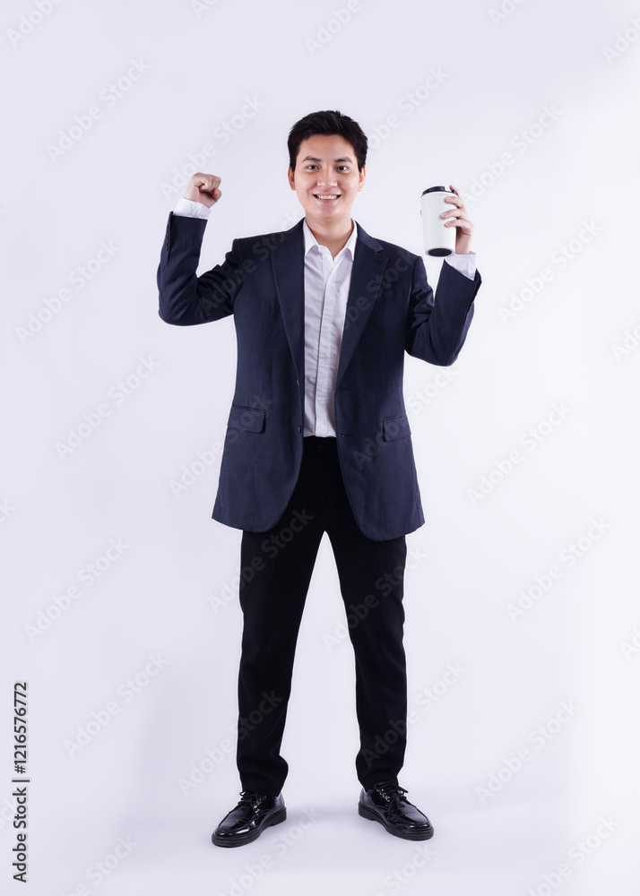 Full body image of a young Asian business man drink coffe and posing on a white background Full body image of a young Asian business man drink coffe and posing on a white background